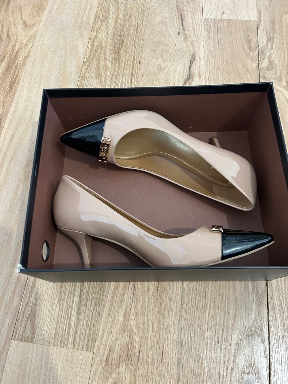 Coach Two-Tone Patent Pointed Toe Flats in Beige and Black with Gold Accent - Picture 4 of 6